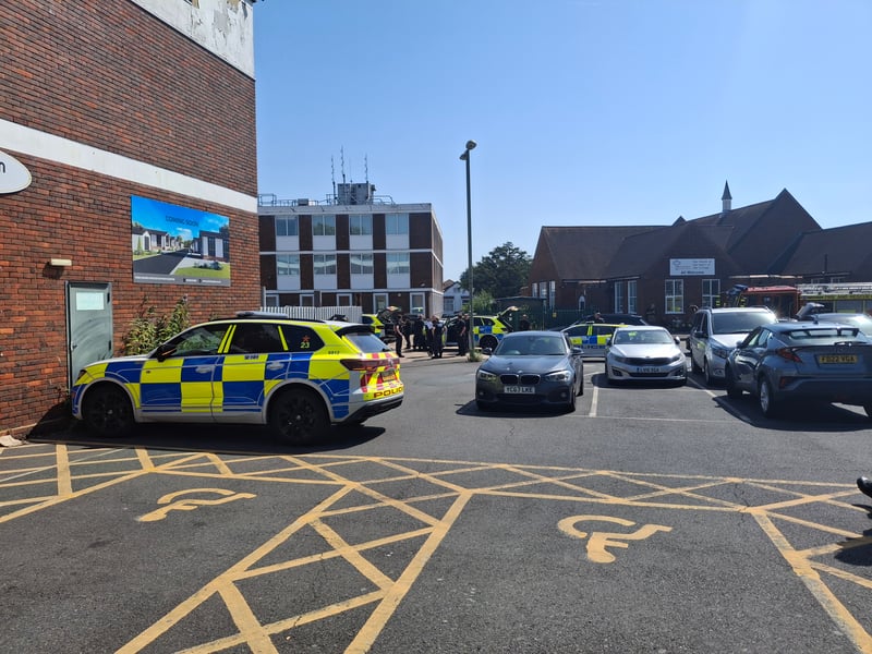 Armed police and fire crews have been deployed to Portchester Precinct, with part of the area "sealed off" from the public.