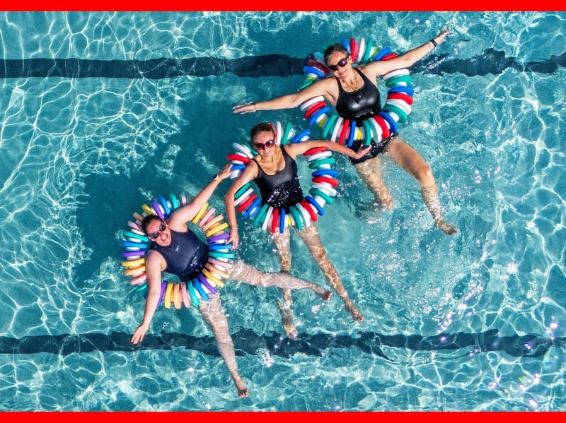 Susie MacDonald, Charlotte Reader and Emma Ledger cool off from the hot weather at Cumnock open-air swimming pool.