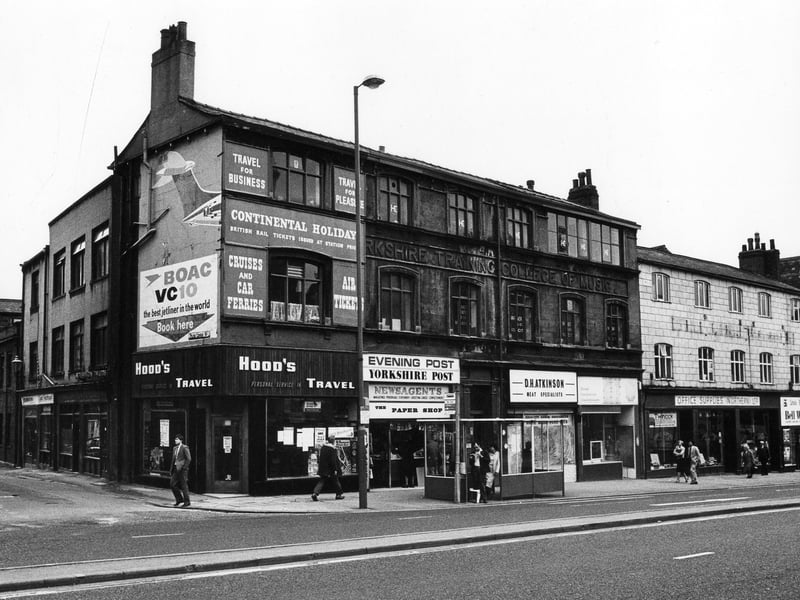 Yorkshire College of Music on The Headrow pictured in October 1981. On the left is Park Cross Street. Hood's Travel shop has a poster advertising 1982 brochures.
