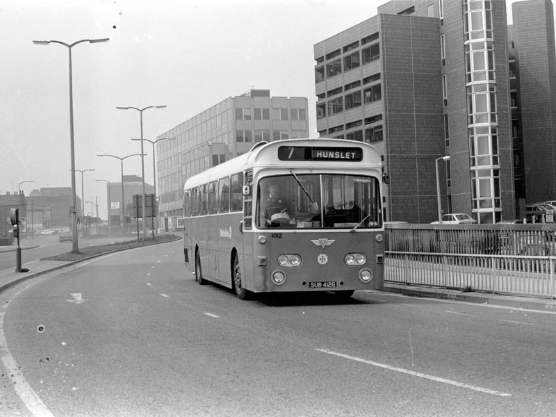 AEC Swift/Park Royal 1012 (1969) bus, registration no SUB 412G on route no 7, destination Hunslet. This is at the junction of Park Lane and the Inner Ring Road in March 1981. Square Building in the centre is Park Lane College, to the right is Concord House.