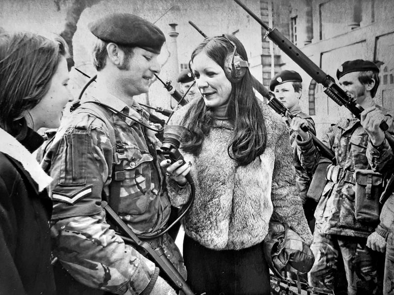Lance-corporal Michael Plant demonstrates his military communications radio to Carol Farrant of Birmingham Road, Walsall, and Norma Foster of Irvine Road, Bloxwich, while out on patrol in Walsall town centre in March 1976. Clad in full combat gear and accompanied by comrades carrying SLR rifles, the local Territorial Army soldiers took to the streets to engage with shoppers and give passers-by a hands-on look at life in the reserves. Did you bump into the Territorial Army patrol in Walsall town centre or try out the radio kit back in the spring of 1976?