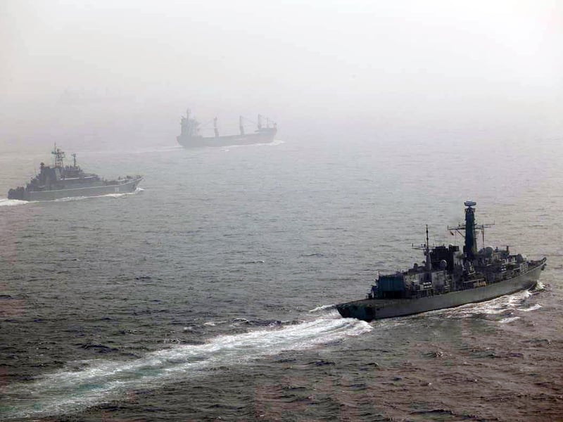 HMS Somerset escorting the Russian Navy Ropucha Class LST Aleksander Shabalin (Left) and the tanker MV Mikhail Britnev (Top) in the English Channel.