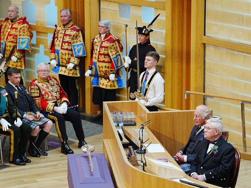 King Charles III and Presiding Officer Kenneth Gibson MSP in the Debating Chamber during the opening of the seventh session of the Scottish Parliament in Edinburgh