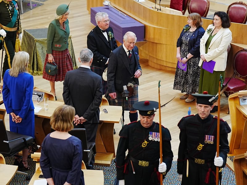 King Charles III, Presiding Officer Kenneth Gibson and Queen Camilla depart following the opening of the seventh session of the Scottish Parliament in Edinburgh.