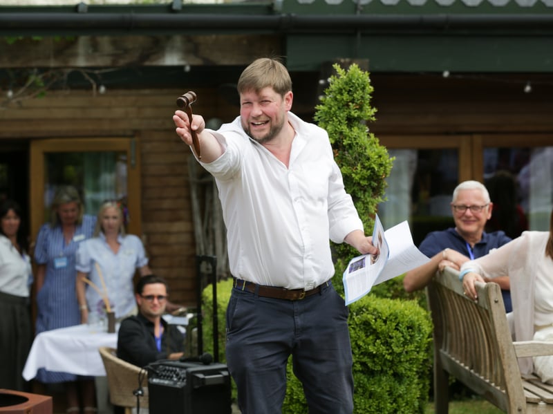 Guests took part in a fundraising auction, led by TV antique expert Angus Ashworth