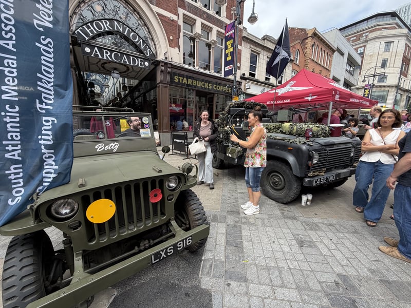 Military vehicles on display outside Thornton's Arcade.