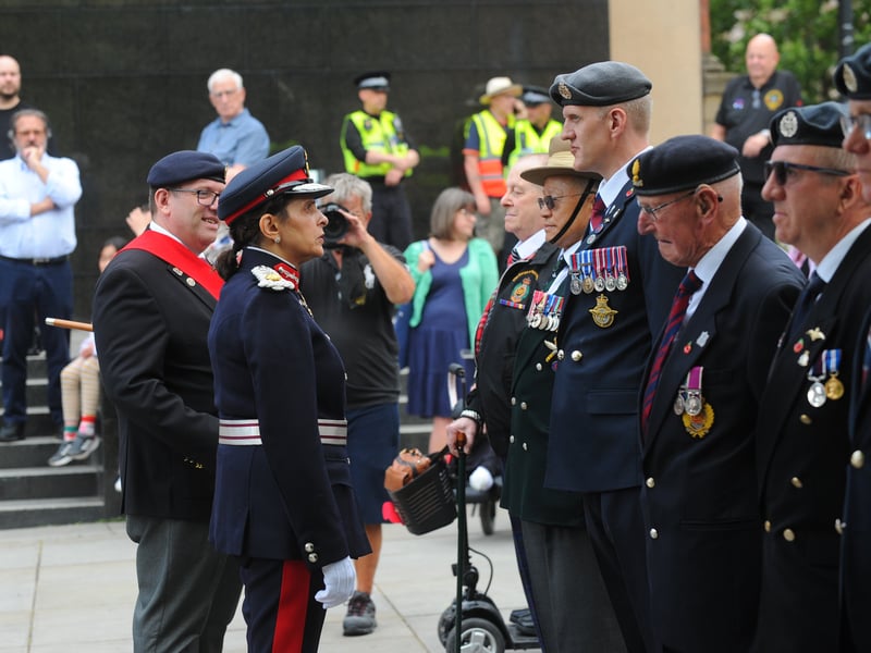 The Lord Lieutenant of West Yorkshire Prof Adeeba Malik inspects the troops in Victoria Gardens.