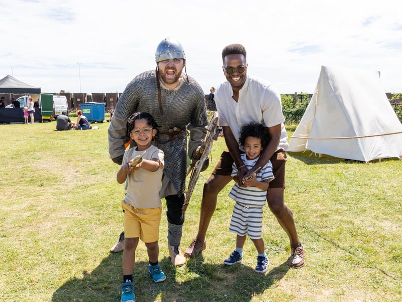 Pictured: Noah, Allistair with dad Cartesse Valero together with Herigeas Hondas team member. Picture: Marcin Jedrysiak