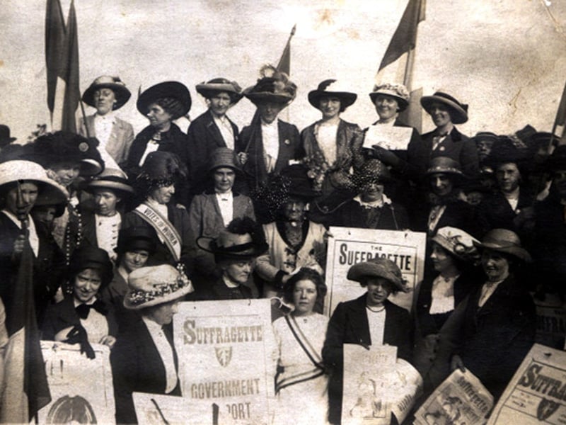 A group of women carrying placards and banners as they take part in the Women's Social & Political Union's Procession to Woodhouse Moor where a huge rally was held.