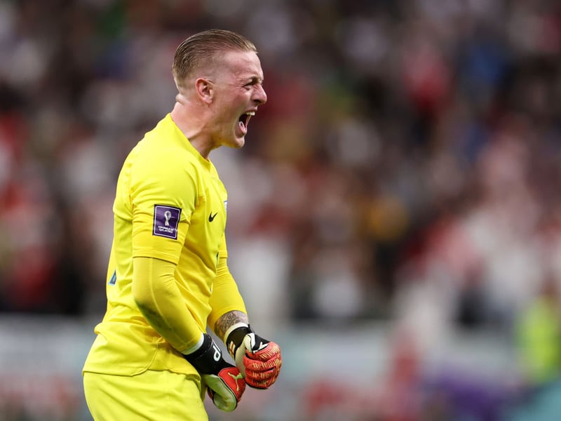 Jordan Pickford celebrates after Harry Kane scores against Senegal in 2022. (Photo by Catherine Ivill/Getty Images)