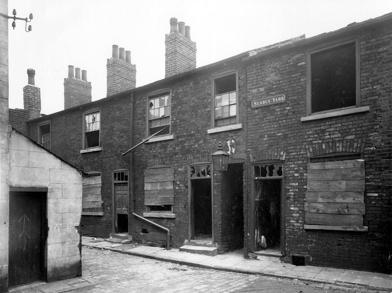 Searls Yard in November 1938. It was located between Accommodation Road and Blossom Street. Derelict houses prior to demolition.