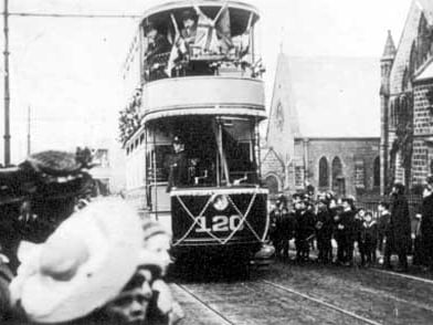 A view taken at the inauguration of the Rawdon tram service. Tram number 120 is outside Benton Congregational Church and school, situated at junction of New Road Side and Green Lane, now Trinity Church. Pictured in May 1900.