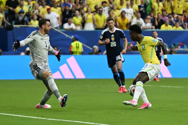 Played every minute after winning the battle with Craig Gordon for the gloves. Only one of Scotland's four goal concessions he was culpable for was Brazil's second, getting caught under a cross. Made some smart saves to keep the score down in match, and also against Morocco. Can be satisfied with his tournament. 7