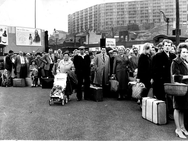 Holidaymakers queue at Pond Street Bus Station, Sheffield, to catch their seaside-bound coaches on a bank holiday weekend in 1962