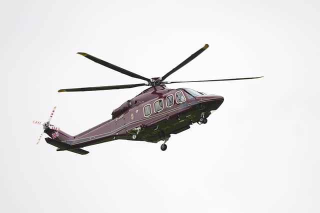 King Charles III arrives in Holyrood in a helicopter