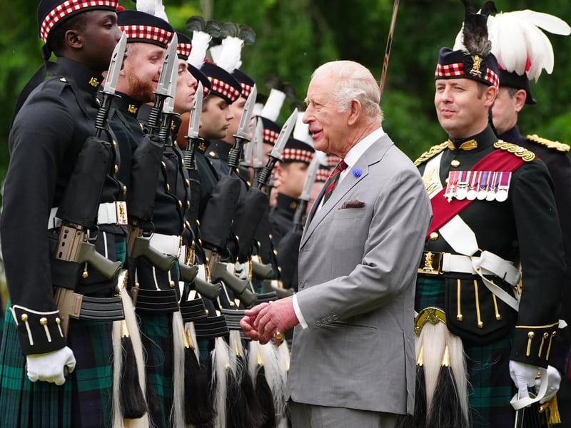 King Charles III inspects the guard of honour