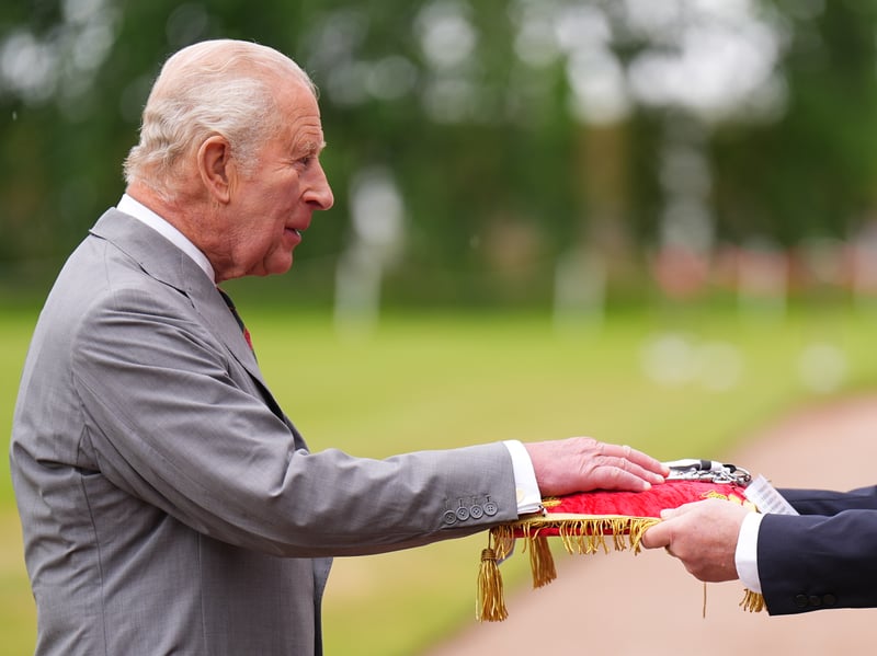 The Lord Provost of Edinburgh Robert Aldridge presents the keys to the City of Edinburgh to King Charles III during the Ceremony of the Keys
