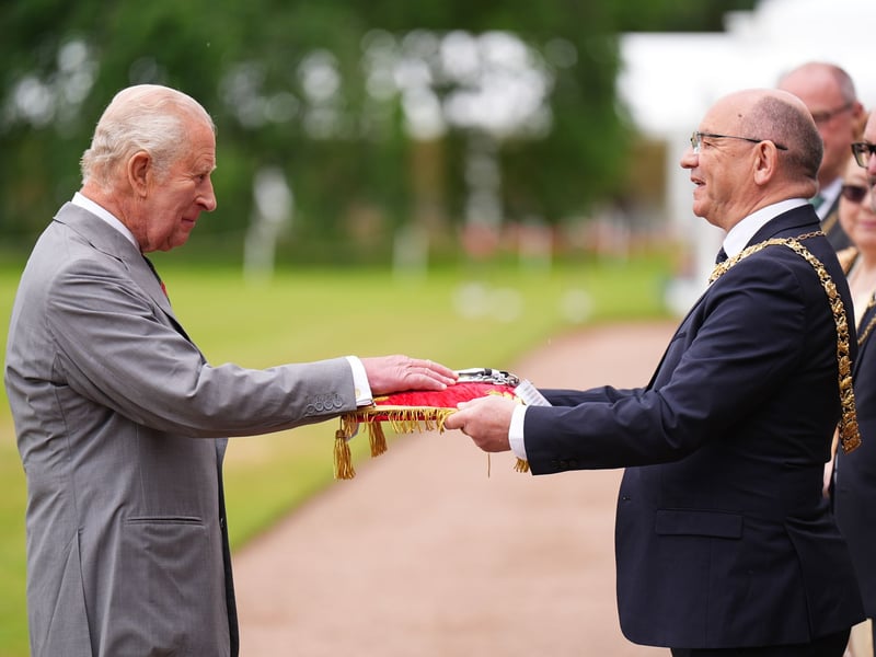 The Lord Provost of Edinburgh Robert Aldridge presents the keys to the City of Edinburgh to King Charles III 