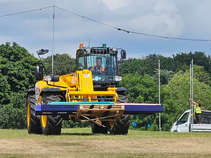 Work continues long into the week ahead of Friday's inaugural event.