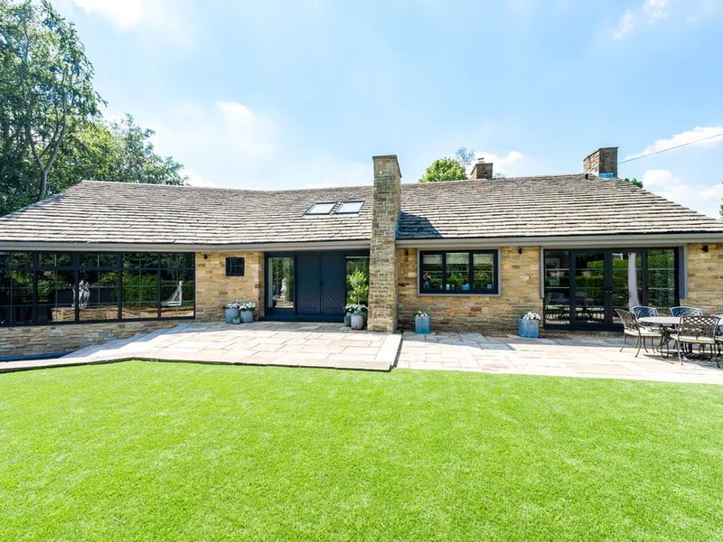 Seven bedrooms, seven bathrooms, 6,394 sq ft.