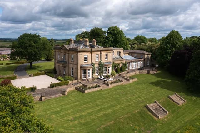 Eight bedrooms, six bathrooms, 14,244 sq ft.