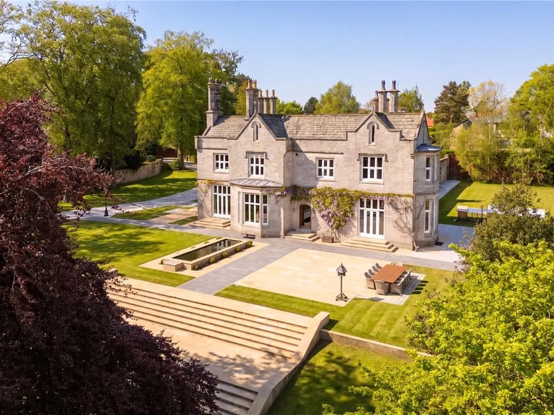 Seven bedrooms, four bathrooms, 8,069 sq ft.