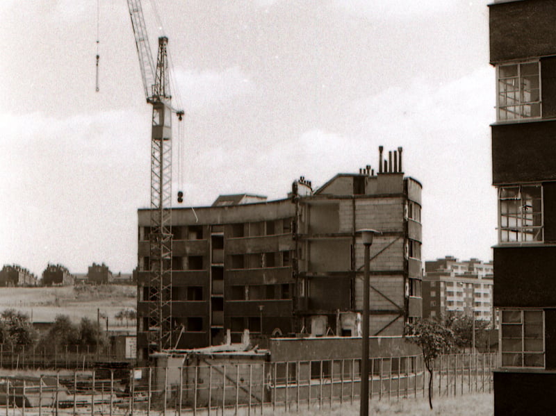 Quarry Hill Flats in the process of demolition in 1977. In the centre is Jackson House, much of which has already been demolished, with only the middle section remaining. On the far right the edge of Wright House can be seen.