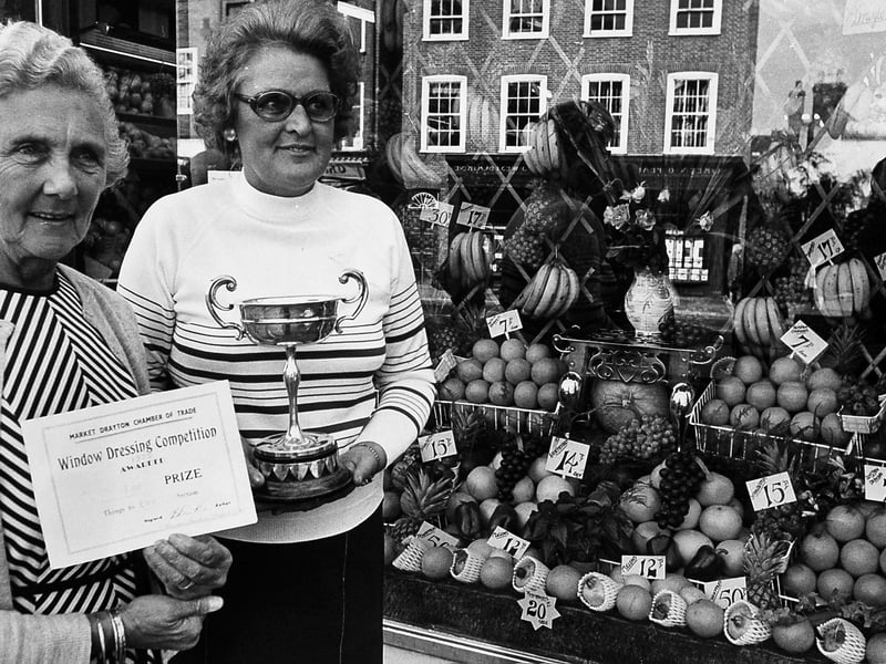 Before online shopping and high street changes, shop windows were a real showcase. Mrs Day Titley and Mrs Winifred Pointon are pictured in 1975 with their prize-winning display for Cunningham’s during Market Drayton Shopping Week. Can you remember the shops that caught your eye?