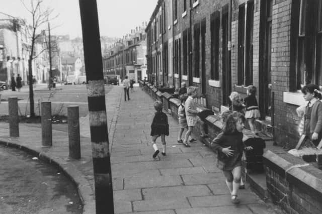Children playing on Burley Lodge Road in October 1970.