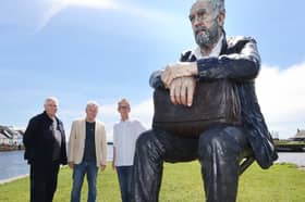 Artist Sean Henry, with Galway International Arts Festival's Paul Fahy and John Crumlish at the Middle Arch, Claddagh, with Sean's Seated Figure, part of his festival show Presence. 