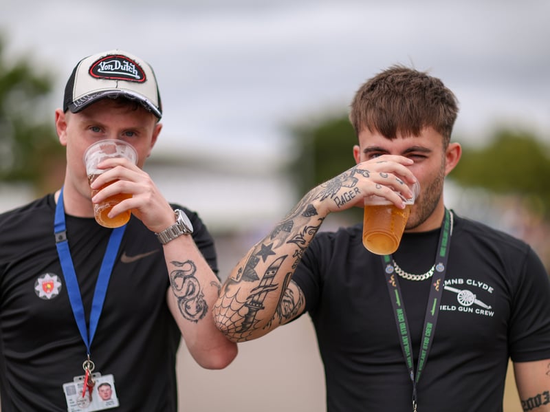 Cameron Mitchell, left, and Lewis Jeffrey enjoy their Amstels. HMS Collingwood Open Day, Fareham
Picture: Chris Moorhouse (040726-18)