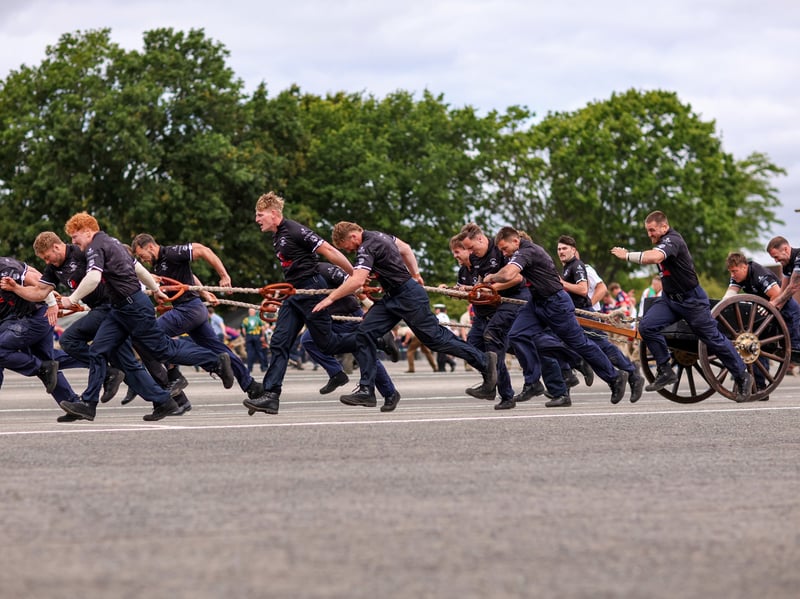 HMS Seahawk winning their heat in the field gun competition. HMS Collingwood Open Day, Fareham Picture: Chris Moorhouse (040726-07)