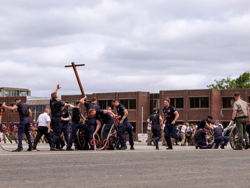 HMS Seahawk winning their heat in the field gun competition. HMS Collingwood Open Day, Fareham Picture: Chris Moorhouse (040726-06)