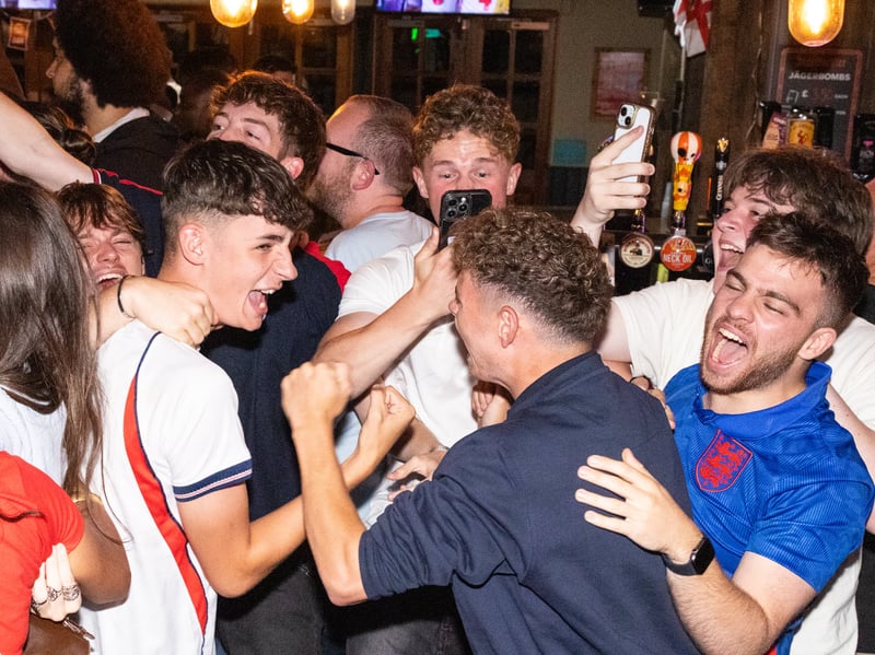 England fans rejoice after Harry Kane scores his second half penalty.