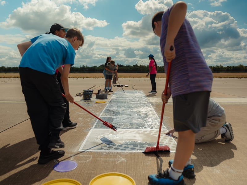 A team of volunteers spent a day plastering on each photo with care. 