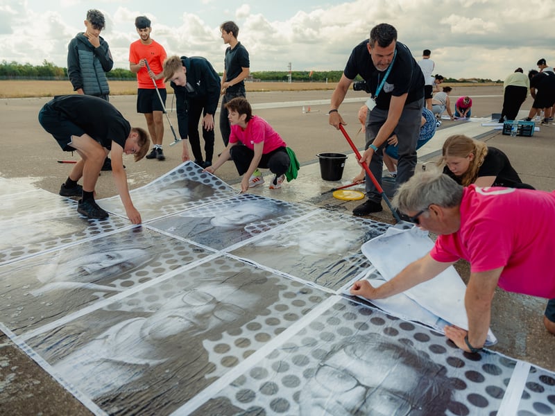 Each portrait was 90cm by 135cm meaning the final collection stretched far down the run way.