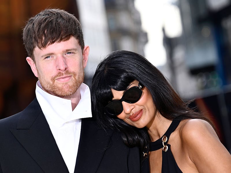 Singer James Blake with actress Jameela Jamil walking the red carpet at the film premiere.
