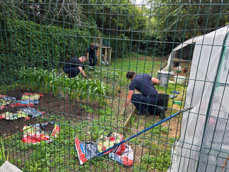 Trainees from HMS Sultan carry out maintenance work at one of two local churches supported during the station's annual INSET Day, demonstrating the base's longstanding commitment to the Gosport community.