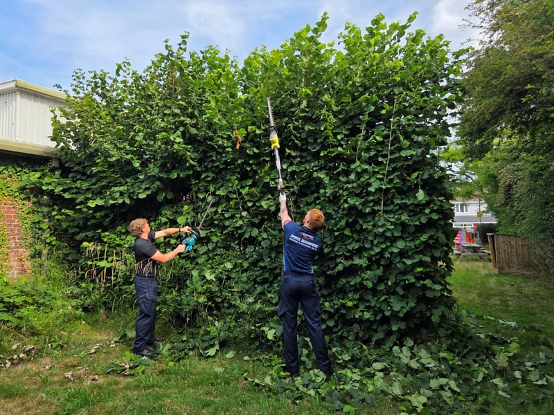 Trainees from HMS Sultan carry out maintenance work at one of two local churches supported during the station's annual INSET Day, demonstrating the base's longstanding commitment to the Gosport community.