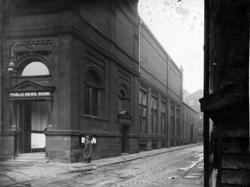 Public Newsroom with entrance on corner of Alexander Street with The Headrow in December 1936.