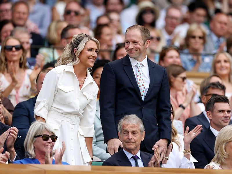 Cycling greats Dame Laura Kenny and Sir Jason Kenny are introduced to the Wimbledon audience.