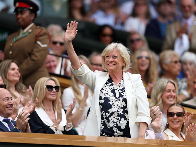 Tennis legend Sue Barker soaks up the applause of the the Centre Court crowd.
