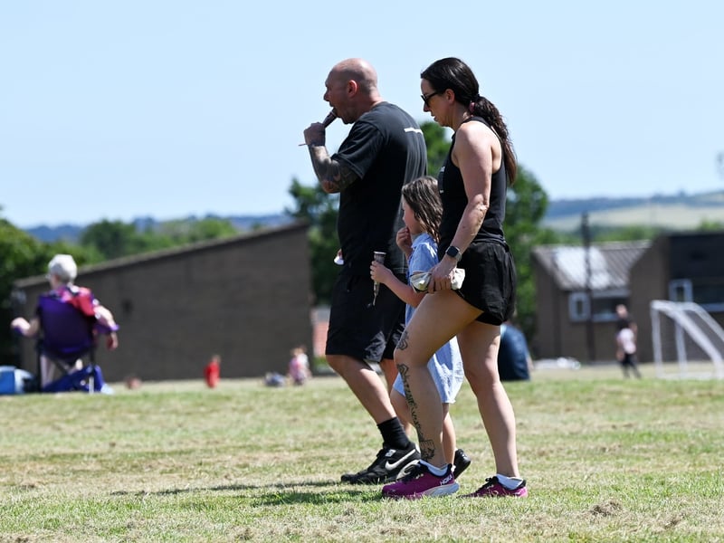 One family colling off with an ice lolly.