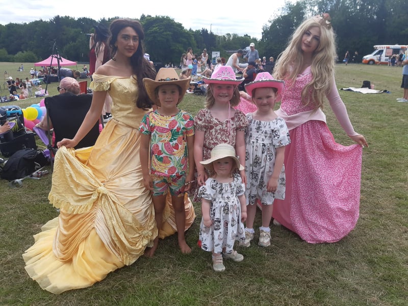 These four cow girls met Disney princesses Belle and Aurora.