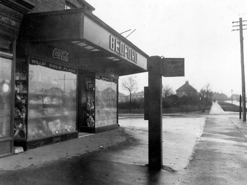 Bedford Confectioners shop on corner of Middleton Park Road with Middleton Park Circus. Goods can be seen displayed in shop windows. Pictured in  December 1938.