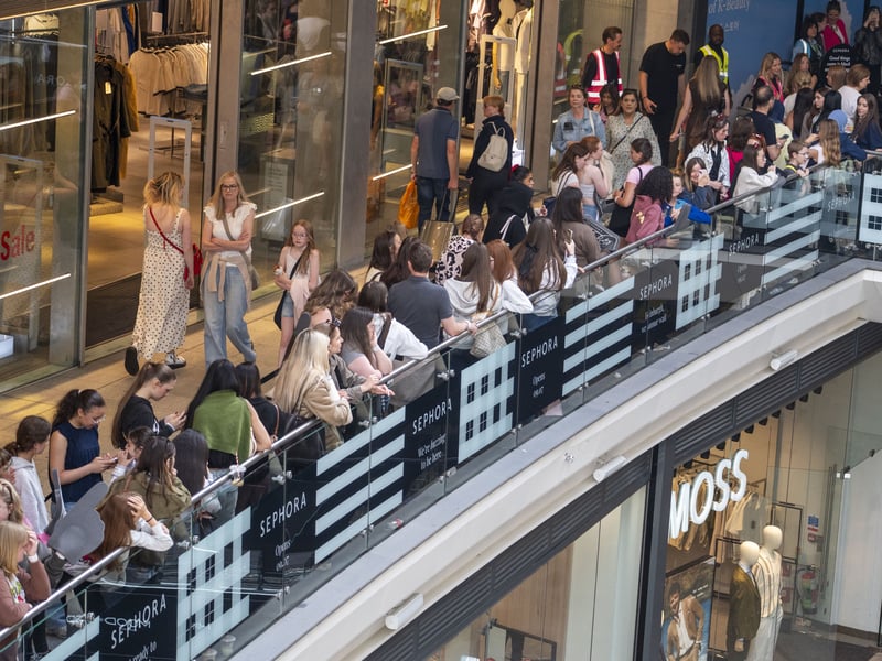 The queue snaked around several levels of the shopping centre.
