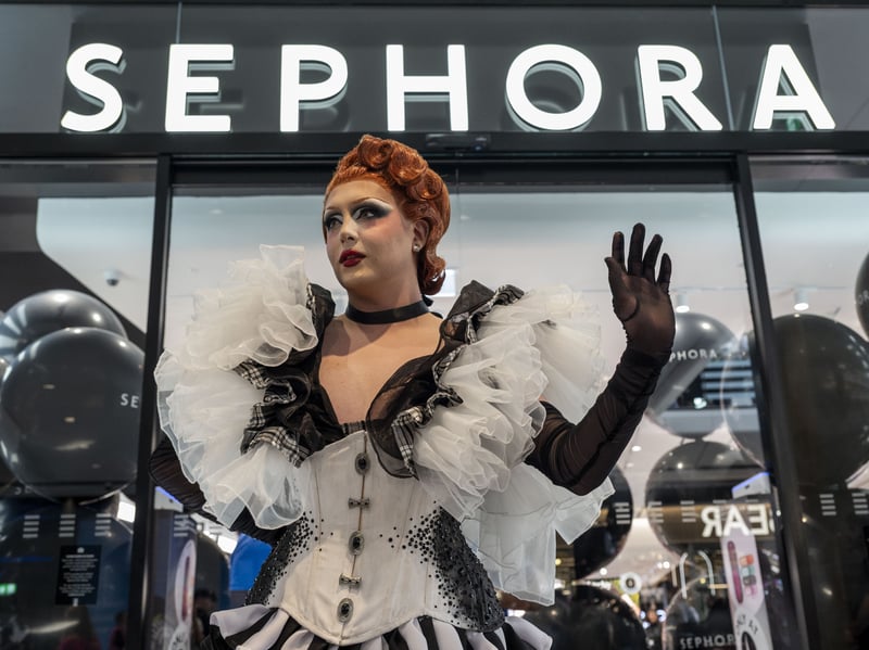 Drag artist Sally Saint Scott put on a show for the grand opening.