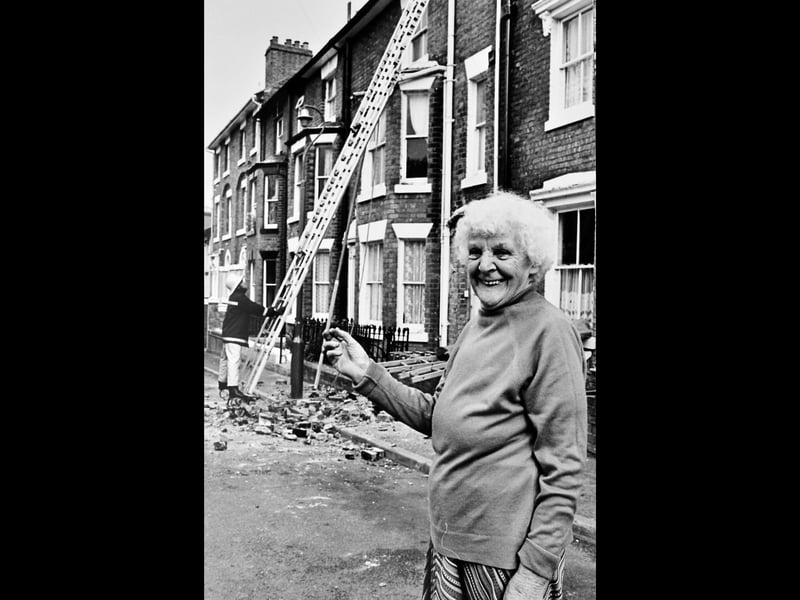 Mrs Bessie Roberts outside her Castlefields home after the Shropshire earthquake of April 1990 toppled her chimney. A rare event that many local people still remember - where were you when the ground started to shake?
