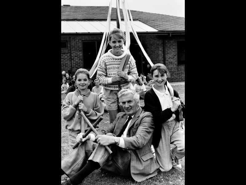 Before the summer fair arrived, the playground at Hodnet Primary School was filled with music, practice and anticipation as pupils prepared their maypole display in June 1992. Do you remember the excitement of school fairs and village events?