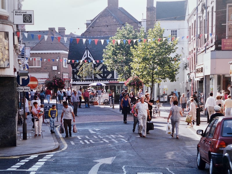 A busy day in Wellington Square during the early 1990s, capturing a town centre full of familiar sights, shopfronts and everyday moments. Take a closer look - what memories come flooding back?
